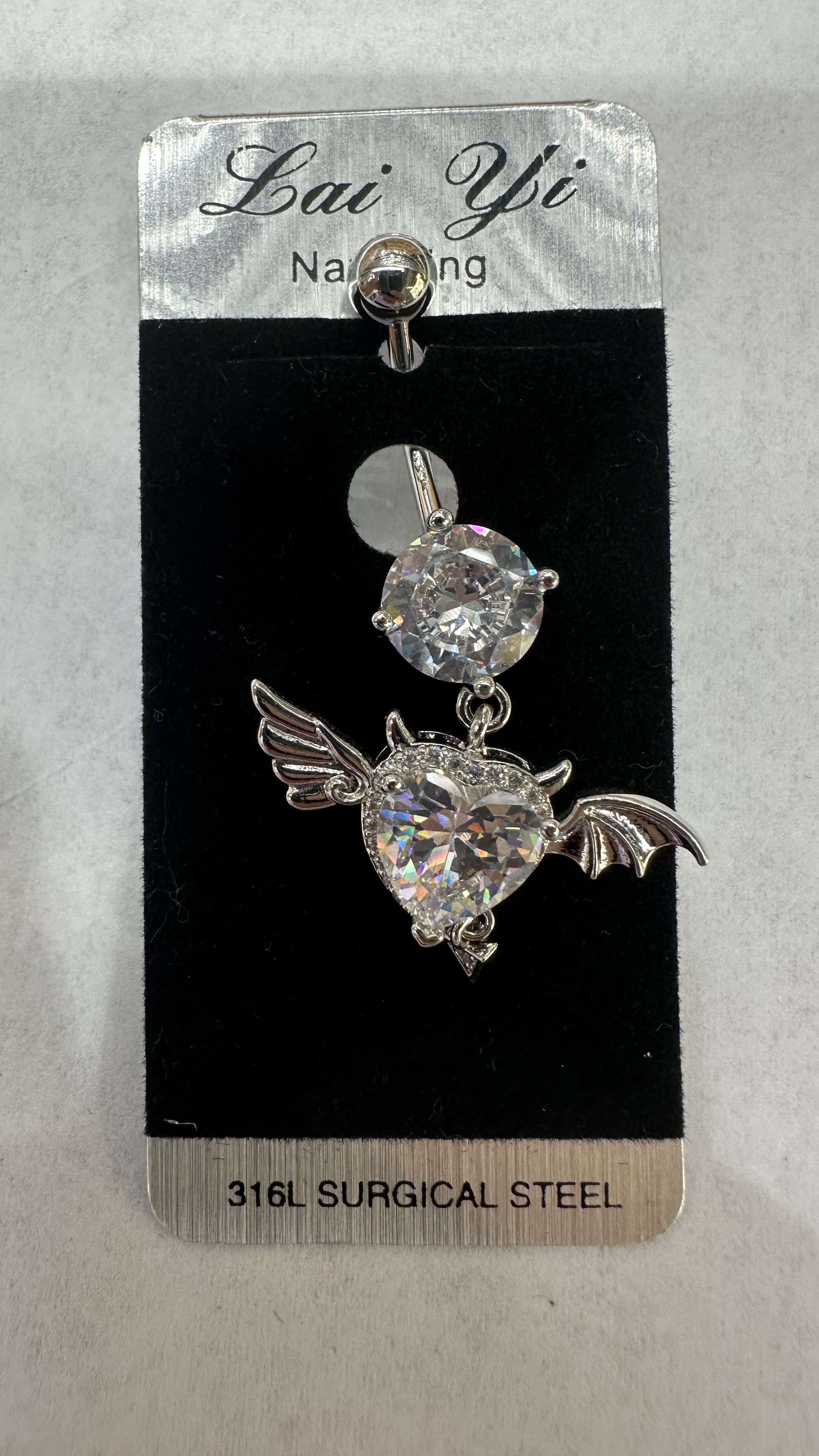 亚马逊热卖饰品、南美、欧美、流行潮流时尚饰品、天使￼肚脐扣、穿刺、潮流时尚饰品。产品图