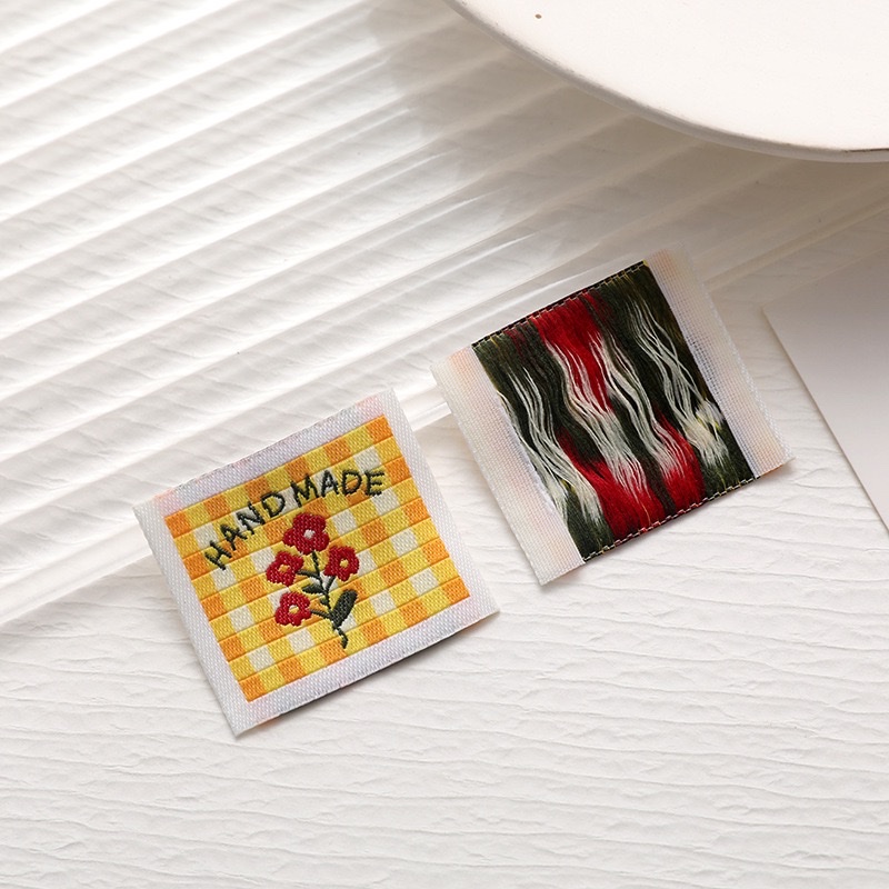 卡通布标彩色刺绣布贴衣服水洗标丝印高密细纱尺码标现货织唛定制商标辅料详情图7