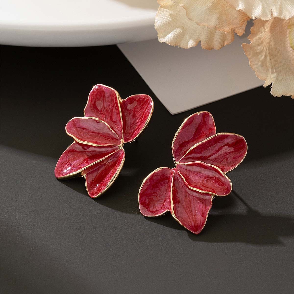 2024 Autumn/Winter retro Hong Kong-style maple leaf oil-dripping flower earrings, fashionable design sense, metal style petal earrings wholesale jewelry details Picture