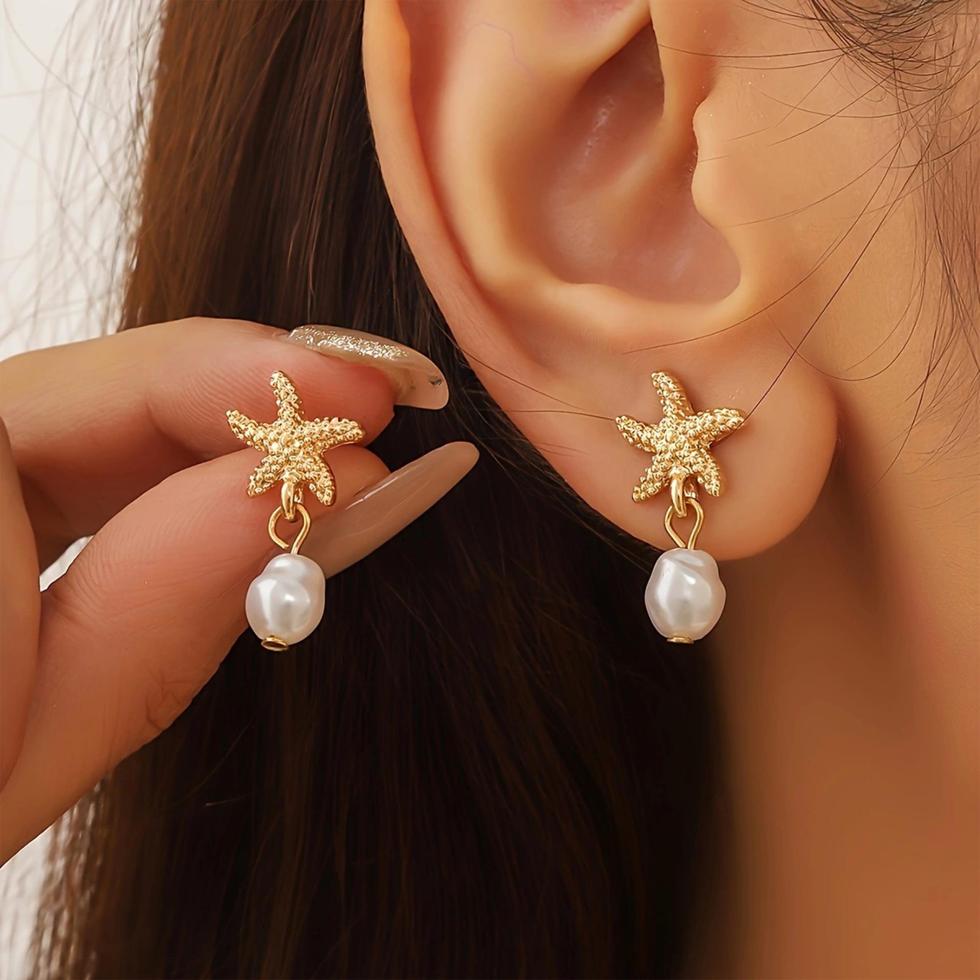 European and American cross-border best-selling personalized and creative starfish series, luxurious and elegant long tassel pearl stud earrings detail image 5