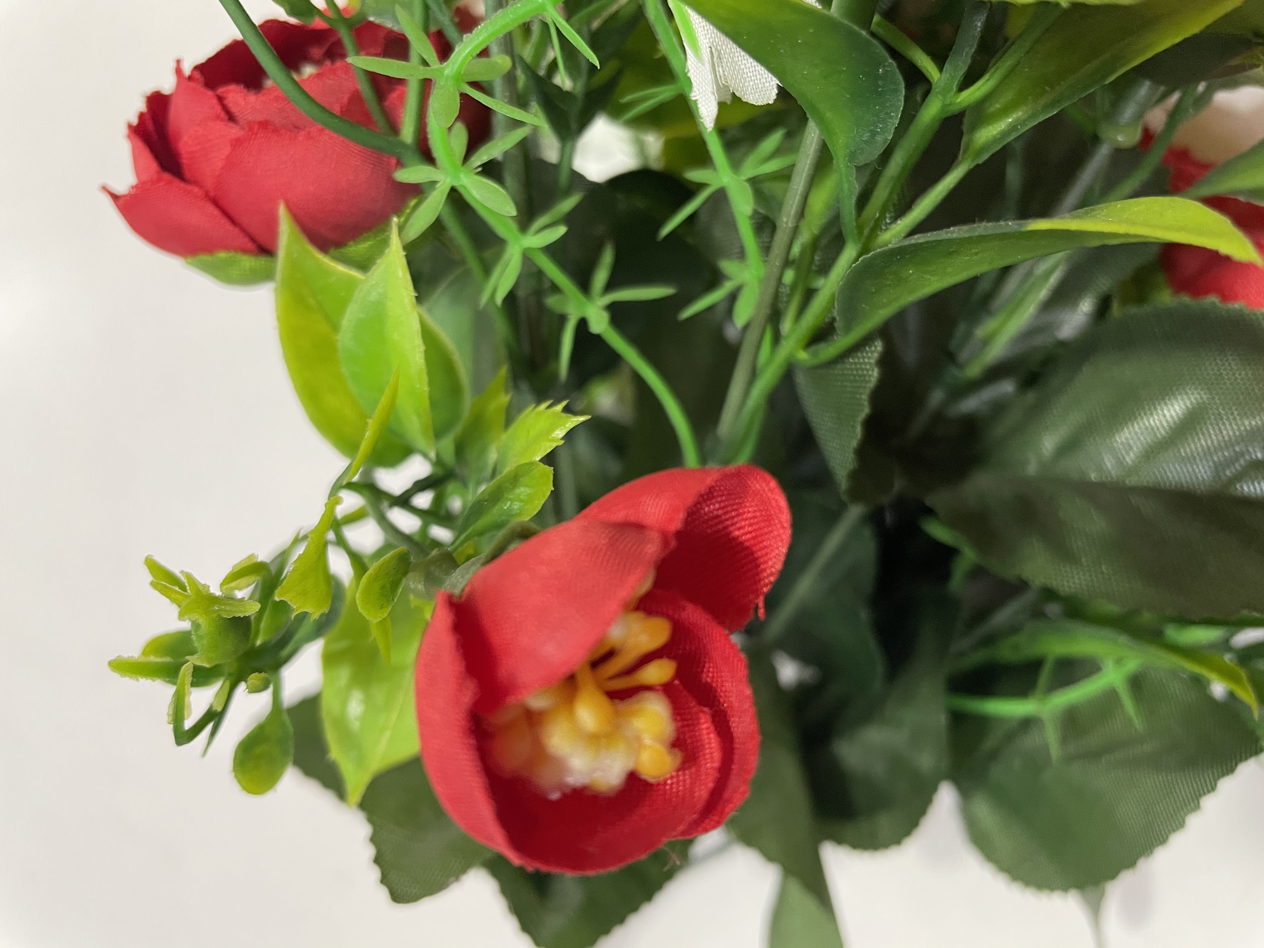 玫瑰花仿真婚庆装饰紫色太阳花仿真假花条室内摆件花艺
12头茶花细节图