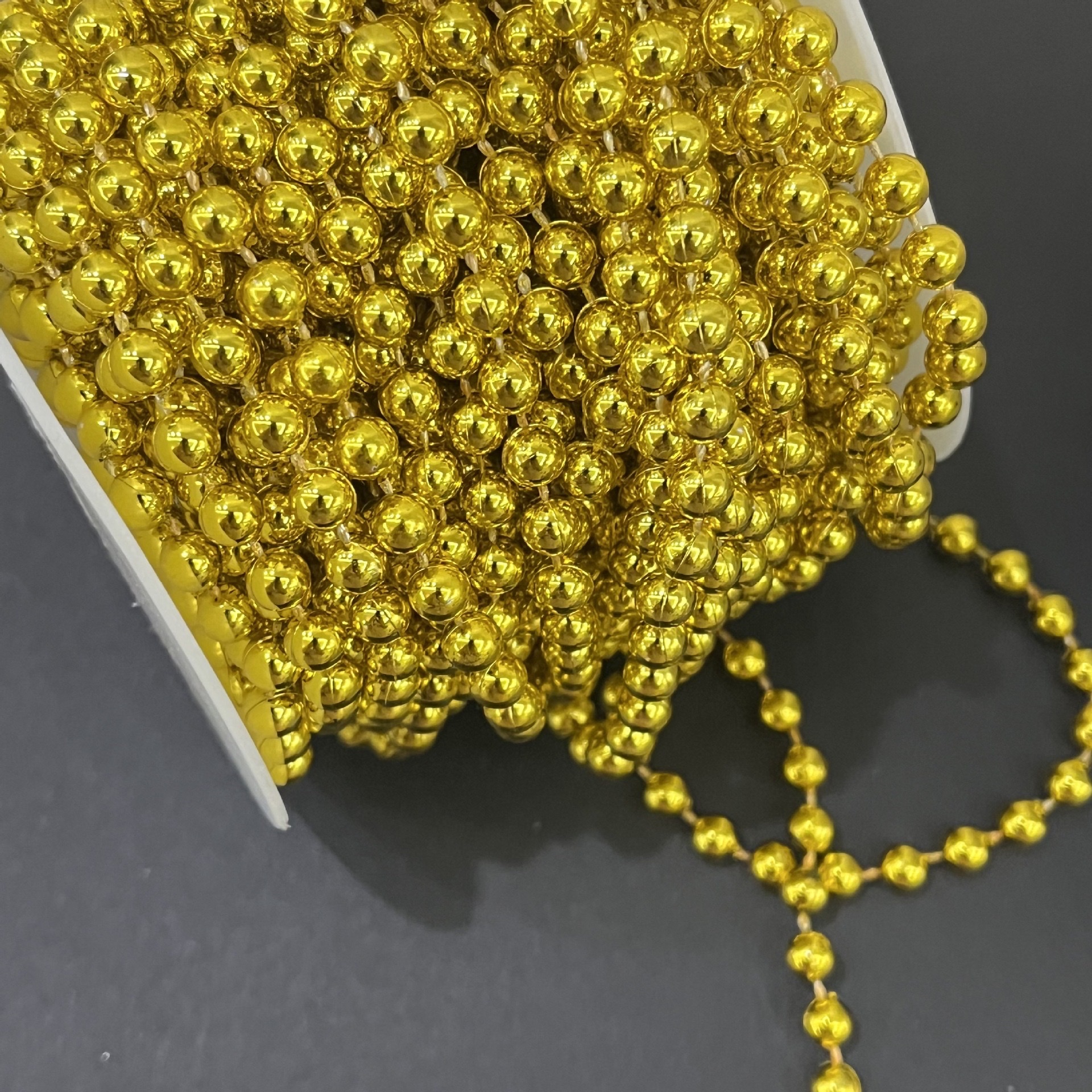 The connecting beads are electroplated in gold detail image 4