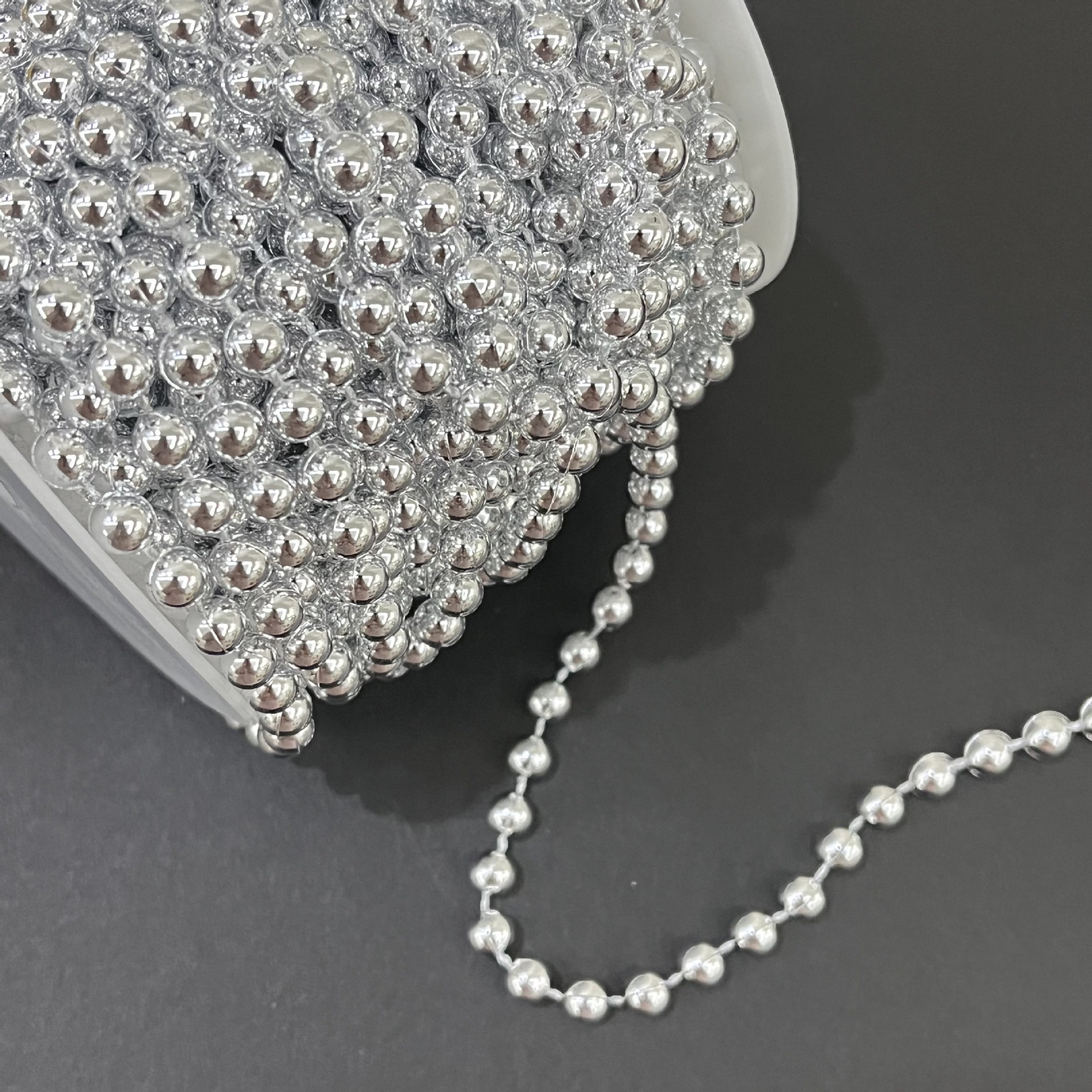 The connecting beads are electroplated in gold Specification image