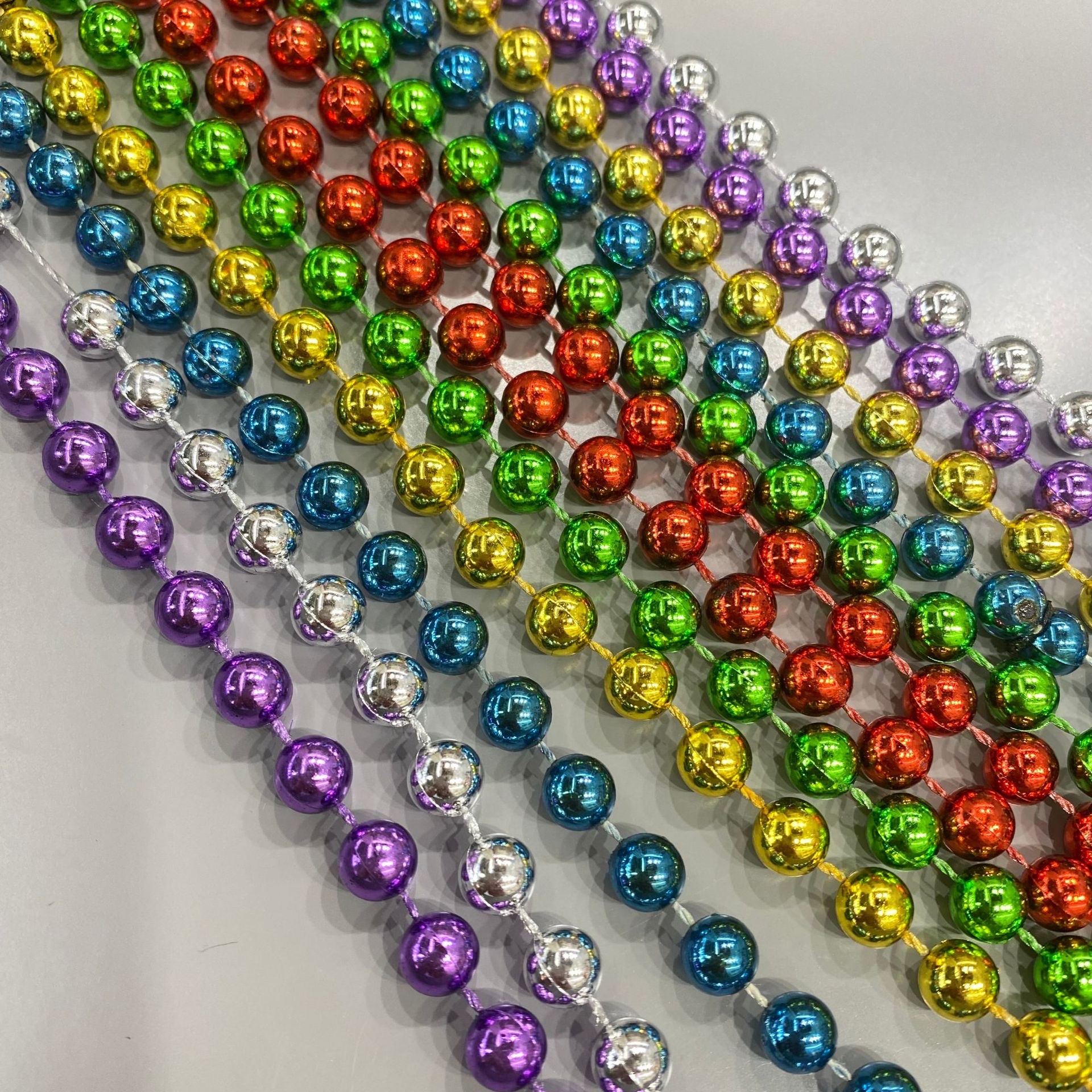 The connecting beads are electroplated in gold