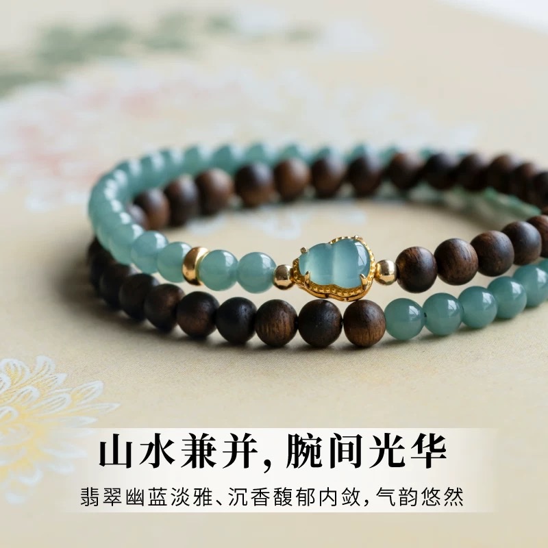 This is a natural agarwood bracelet with the same style as famous stars. It features a blue water jade double-ring bracelet and a female jade gourd with a 925 silver inlaid design Application Scenario