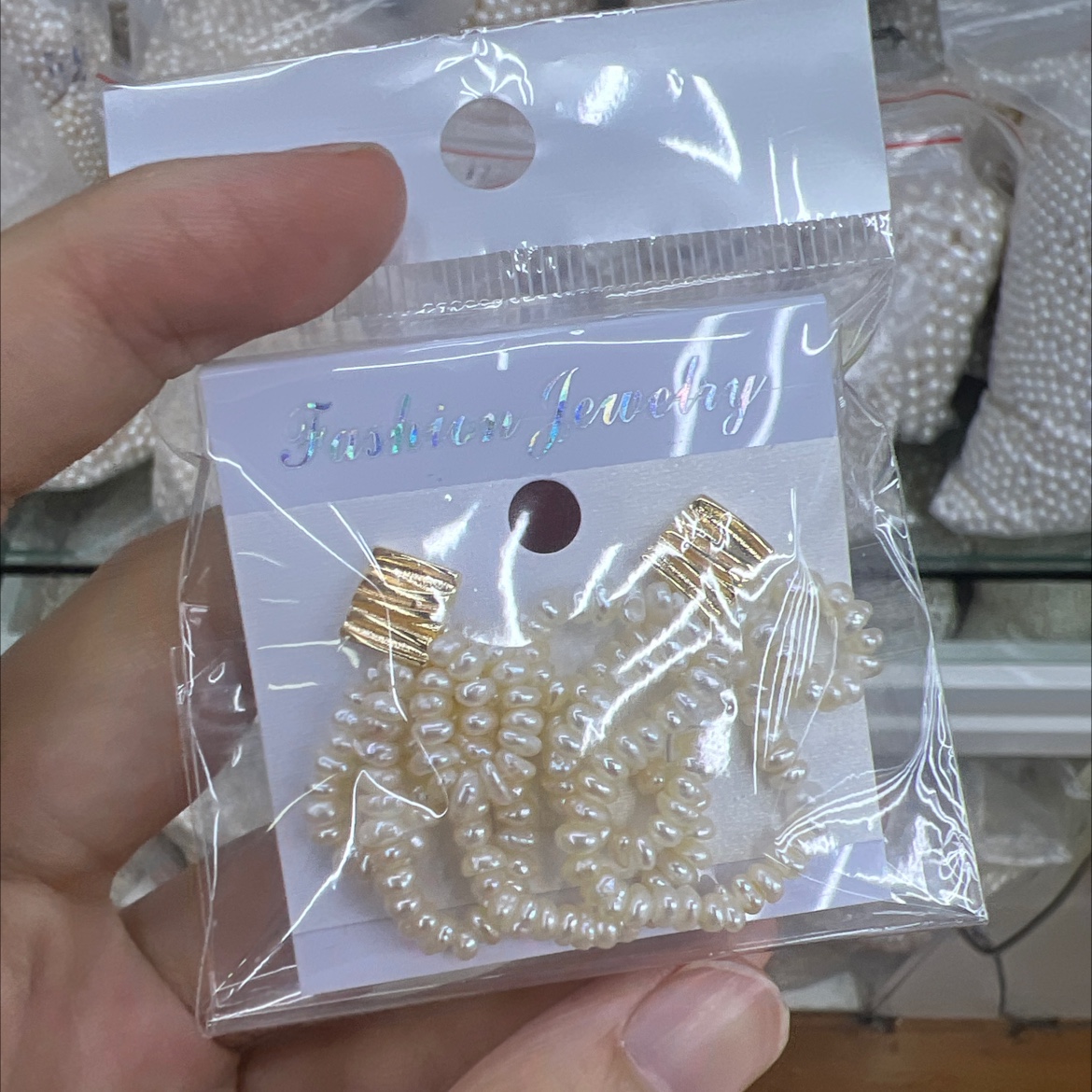 Natural freshwater pearl bow earrings, hand-woven style details Picture