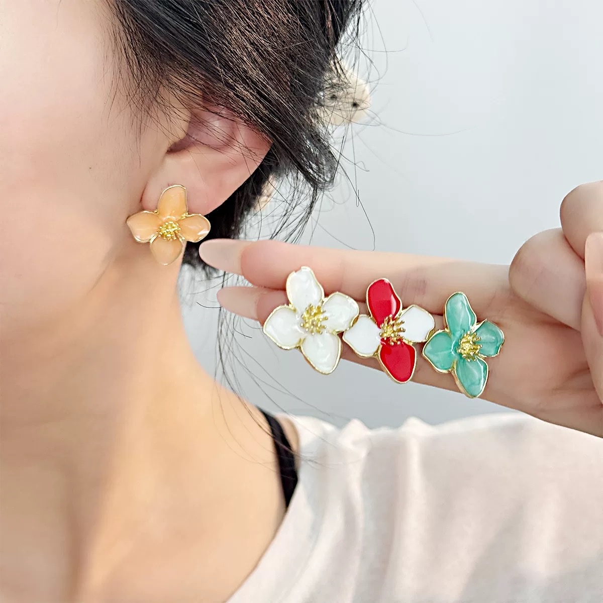 Enamel drop glaze flower stud earrings for women, with a niche design sense and a high-end, light luxury style. Stainless steel earrings, a new bestseller in 2025 Item Picture
