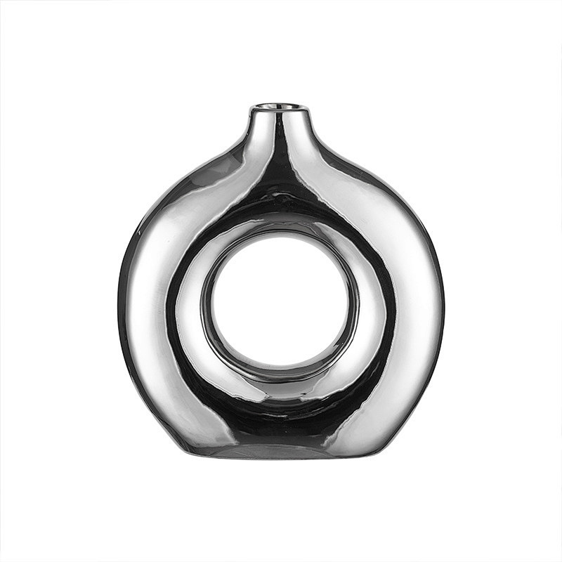 Minimalist modern electroplated silver ceramic vase, high-end decorative art piece, hollow round creative ceramic display piece, ceramic vase, ceramic