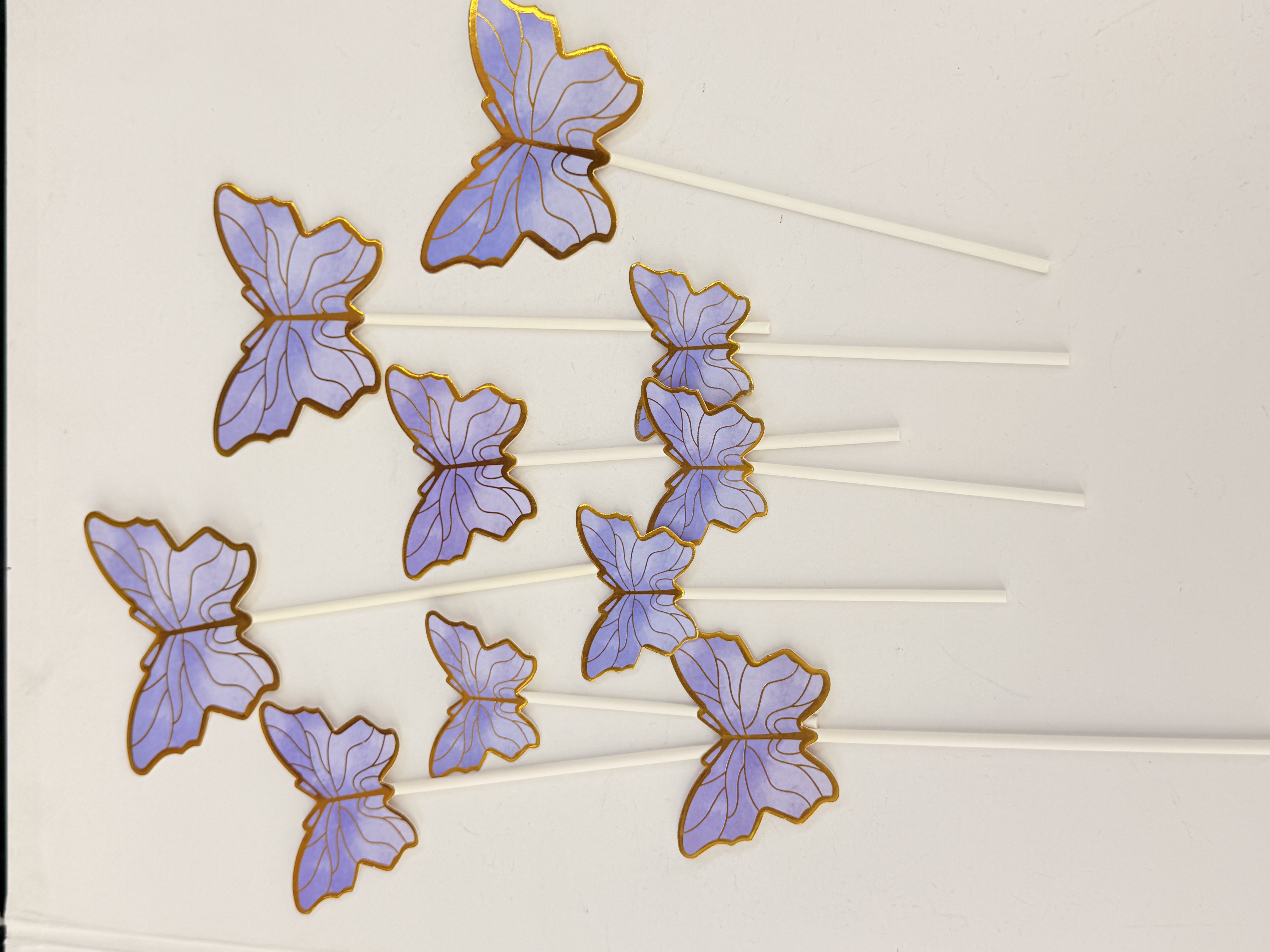 Gold-embossed purple butterfly cake plugin