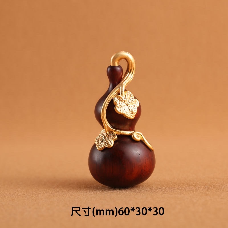 Factory wholesale of rosewood inlaid with copper and plated with 18K gold leaf gourds, keychains, handicrafts, gifts and accessories Application Scenario