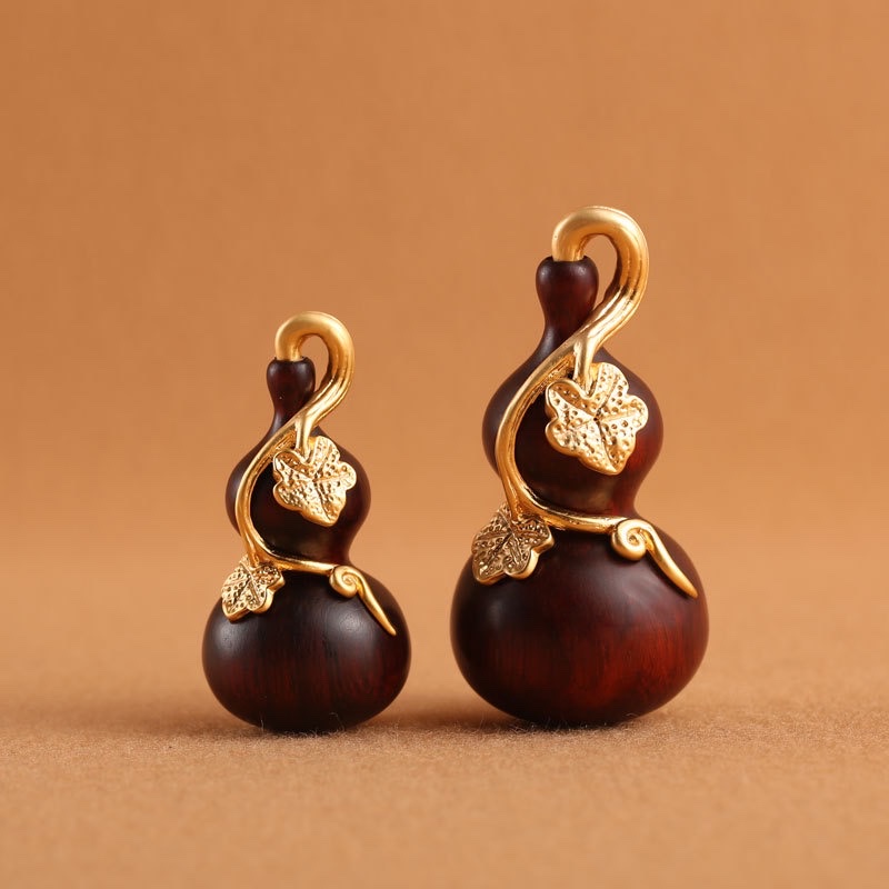 Factory wholesale of rosewood inlaid with copper and plated with 18K gold leaf gourds, keychains, handicrafts, gifts and accessories