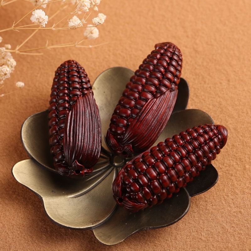 Wholesale of rosewood carved handlebars, cultural toys, corn pendants, keychains, diy decorative accessories and handicrafts from the manufacturer