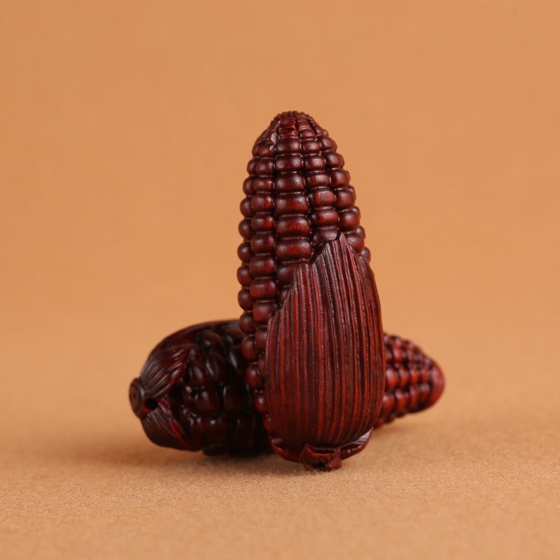 Wholesale of rosewood carved handlebars, cultural toys, corn pendants, keychains, diy decorative accessories and handicrafts from the manufacturer details Picture