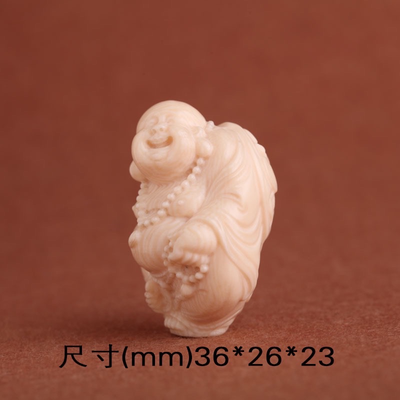 Factory direct supply of carved mammoth tooth pendants, accessories, keys, ornaments, handicrafts, gifts, Yiwu small commodities Application Scenario