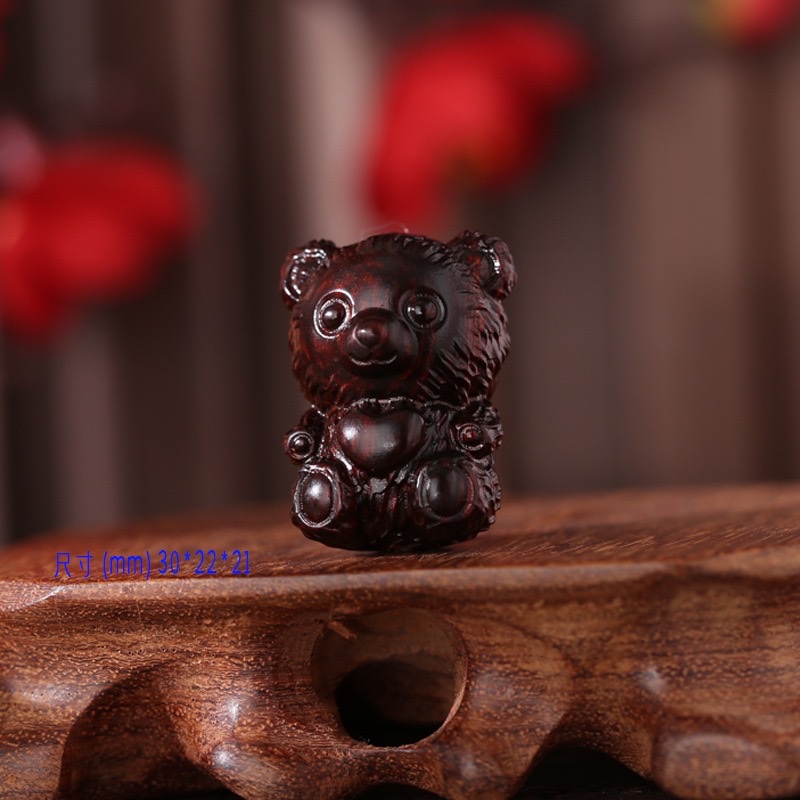 Wholesale of rosewood carved car hangers, keychains, teddy bear ornaments, accessories, bags, hanging handicrafts and gifts from the manufacturer detail image 4