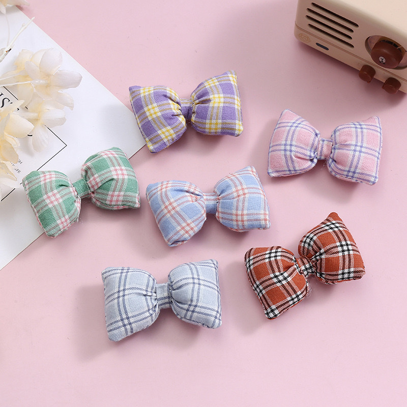 Wholesale of Korean-style cotton and linen checkered pure cotton waist bags, bows, children's hairpins, clothing accessories, brooches and jewelry accessories