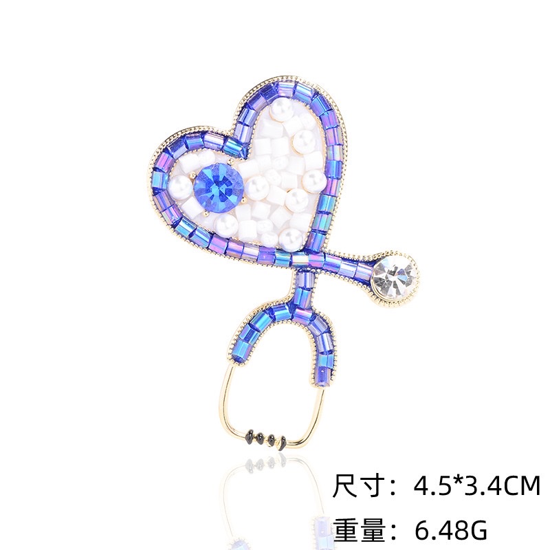 0115 Aoma Accessories Cross-border Creative Love Stethoscope brooch Red and Blue Imitation Crystal European and American fashionable medical High-end pin Accessories wholesale Application Scenario
