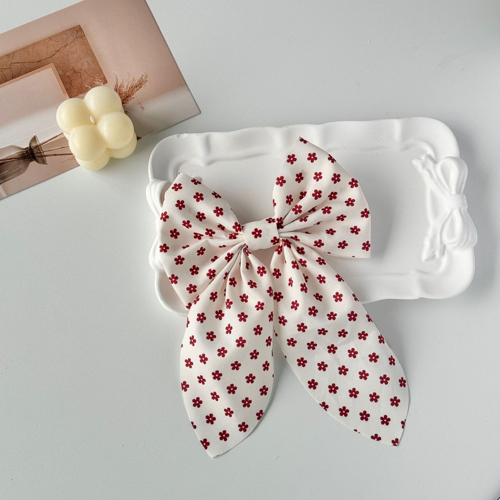 The new Angolan red bow hair clip is sweet and cute, and the ins cream white super fairy-like hair rope accessory detail image 7