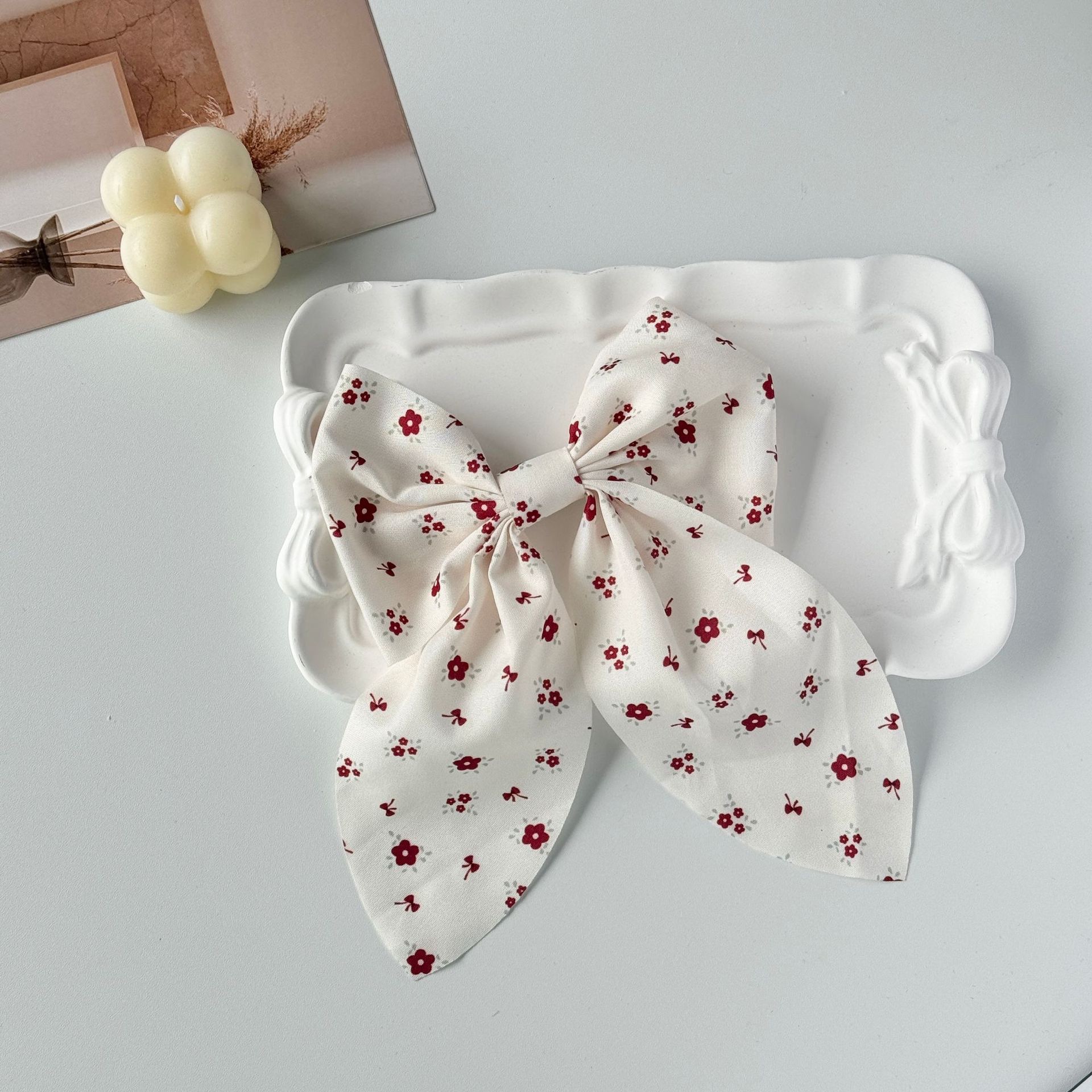 The new Angolan red bow hair clip is sweet and cute, and the ins cream white super fairy-like hair rope accessory Application Scenario
