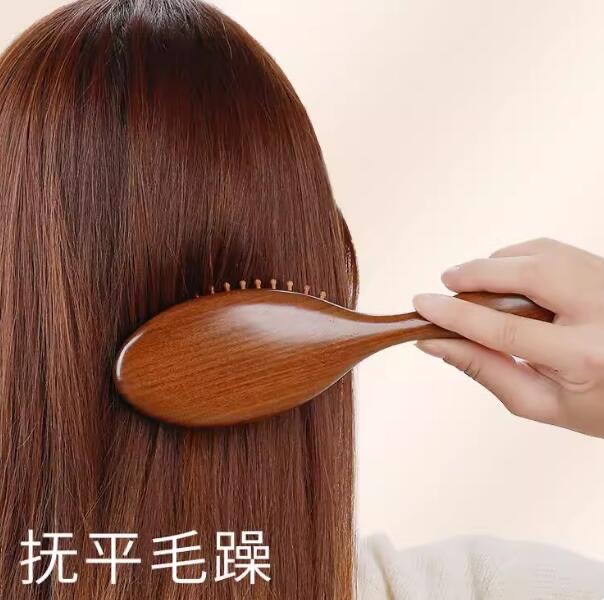 金丝檀气垫梳，按摩头部，肩颈按摩木质品工艺品产品图