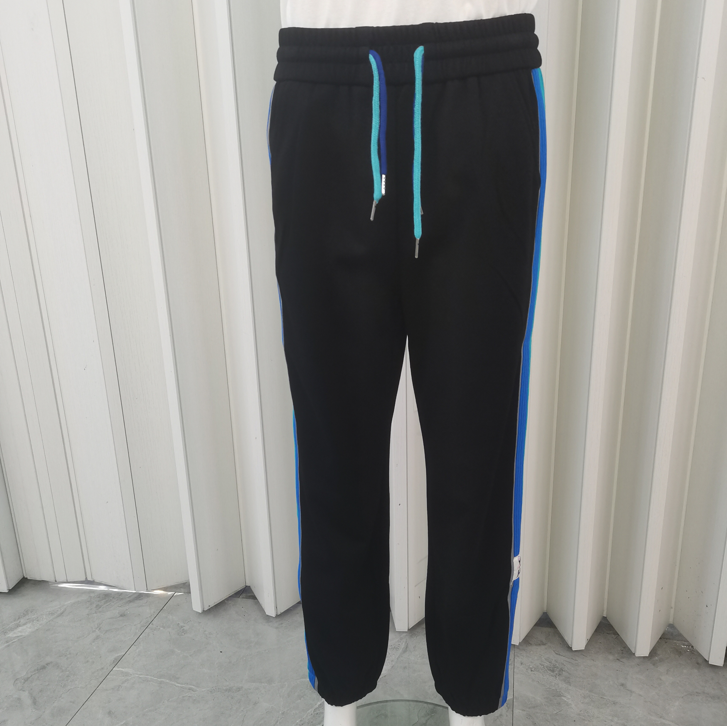 2025春秋季女裤时尚流行款黑色加蓝色条边松紧腰带腰绳长裤