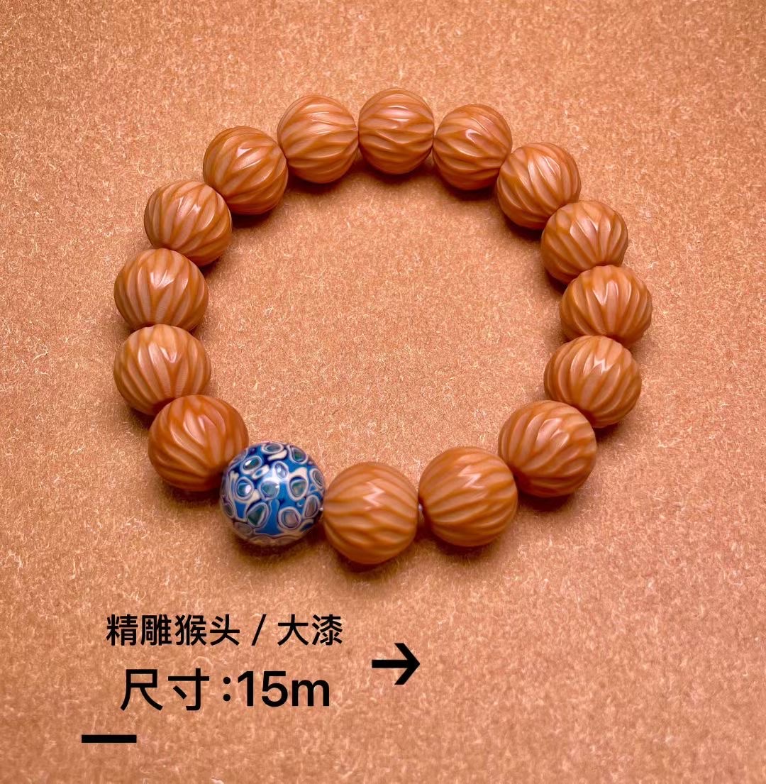 厂家直销精工猴头手串大漆珠盘串赠品