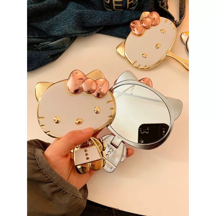 可爱KT猫小镜子女随身携带手持迷你化妆镜立体折叠补妆镜happy凯蒂猫女生学生宿舍办公室随身携带小镜子折叠桌面镜化妆镜产品图