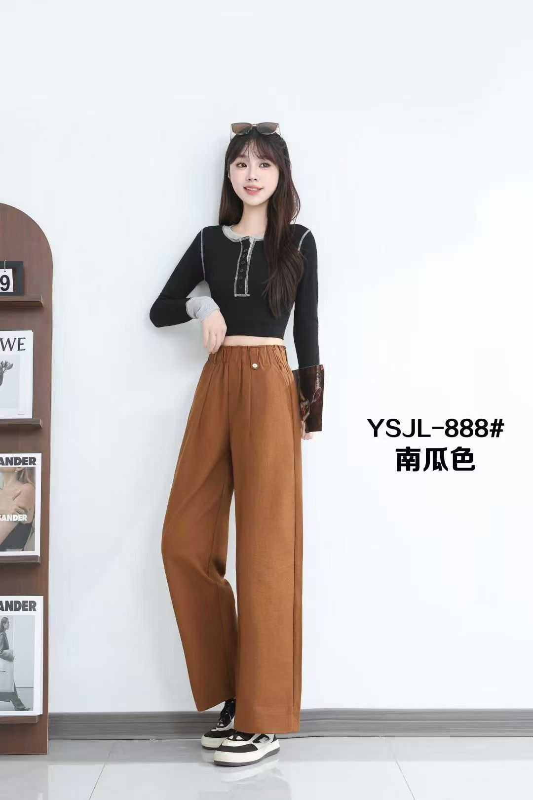 In the autumn and winter of 2025, women's trousers are fashionable and trendy straight-leg pants with a stretchy pumpkin color at the waist details Picture
