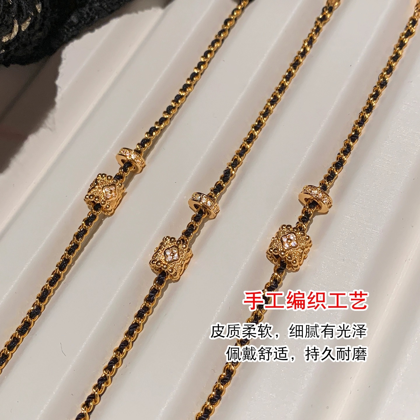 A vintage black rope gold four-leaf clover bracelet for women, a light luxury, niche and high-end look, a small waist accessory for attracting wealth detail image 4