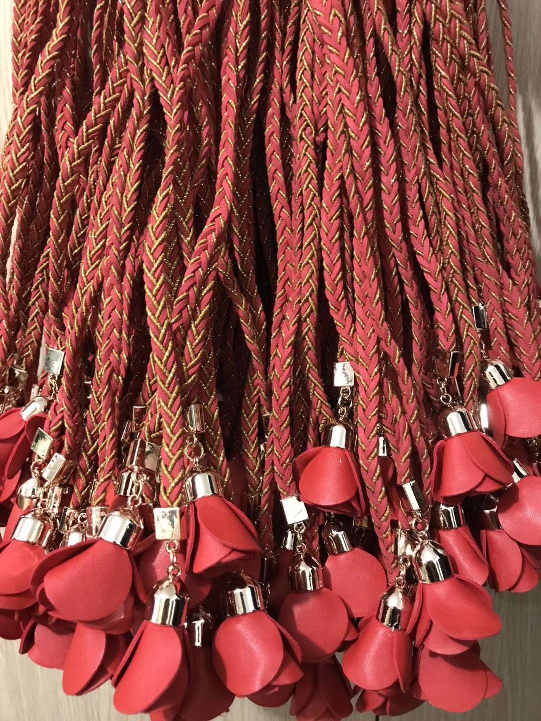 Haihua Clothing Accessories, a best-selling manufacturer, offers direct sales and customization of rope accessories, including Korean velvet and ten gold threads