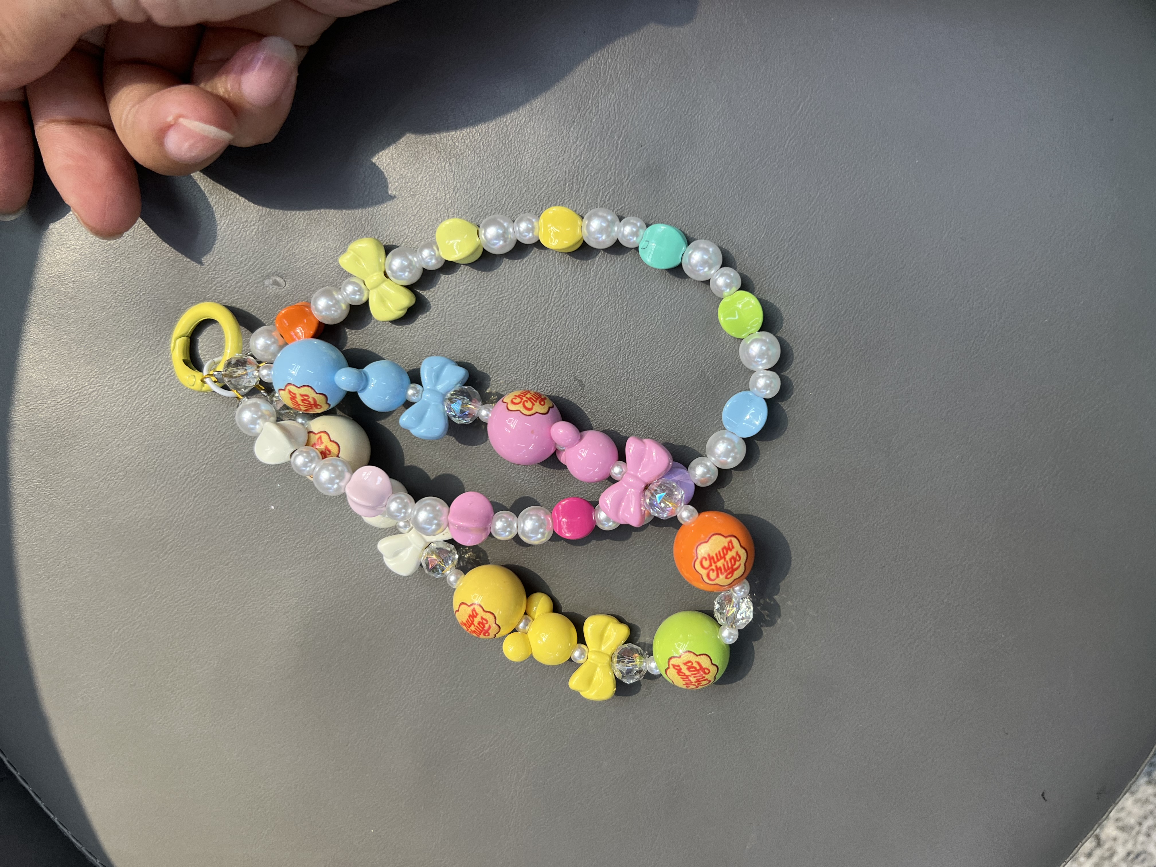 The latest trendy mobile phone pendants, bag pendants and clothing items details Picture