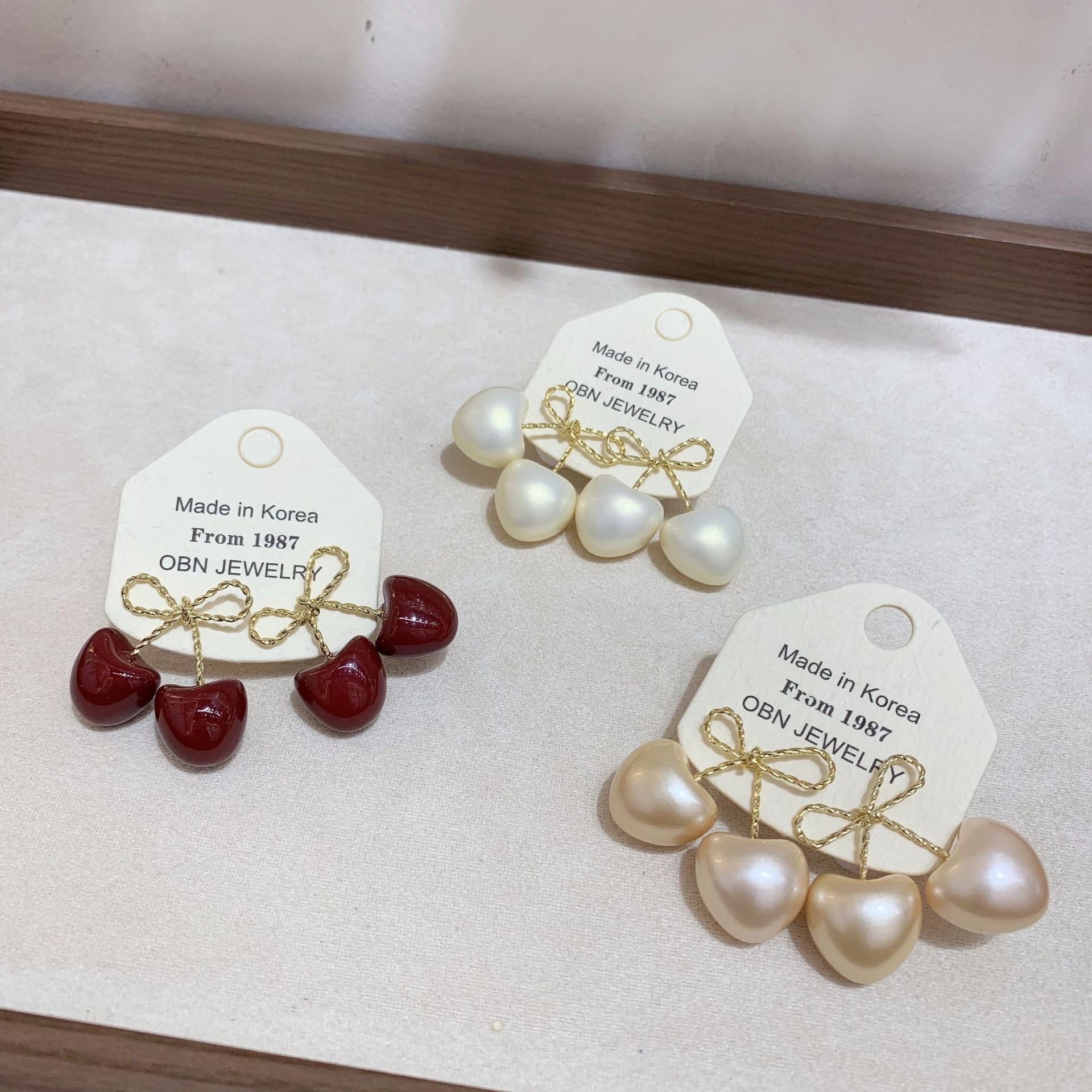 The new stylish bow, niche cherry stud design, red simple and fashionable earrings, sweet and cute detail image 2