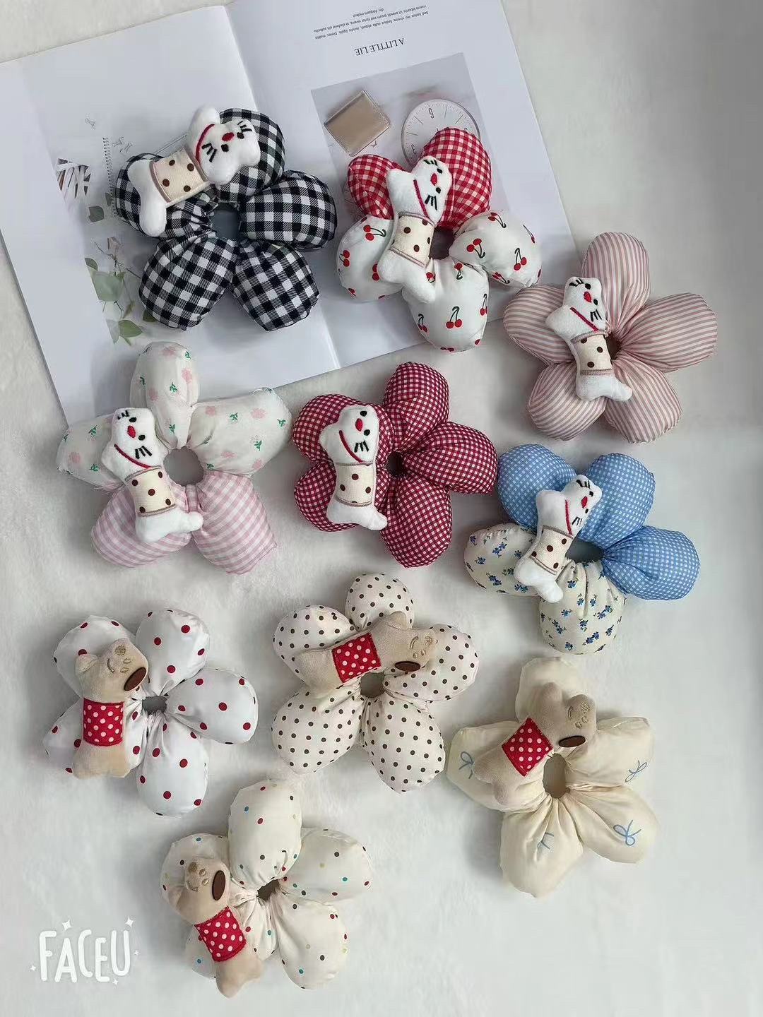 Trendy and fashionable dachshunds with cotton puffy hair bands, high ponytail hair bands and large intestine bands