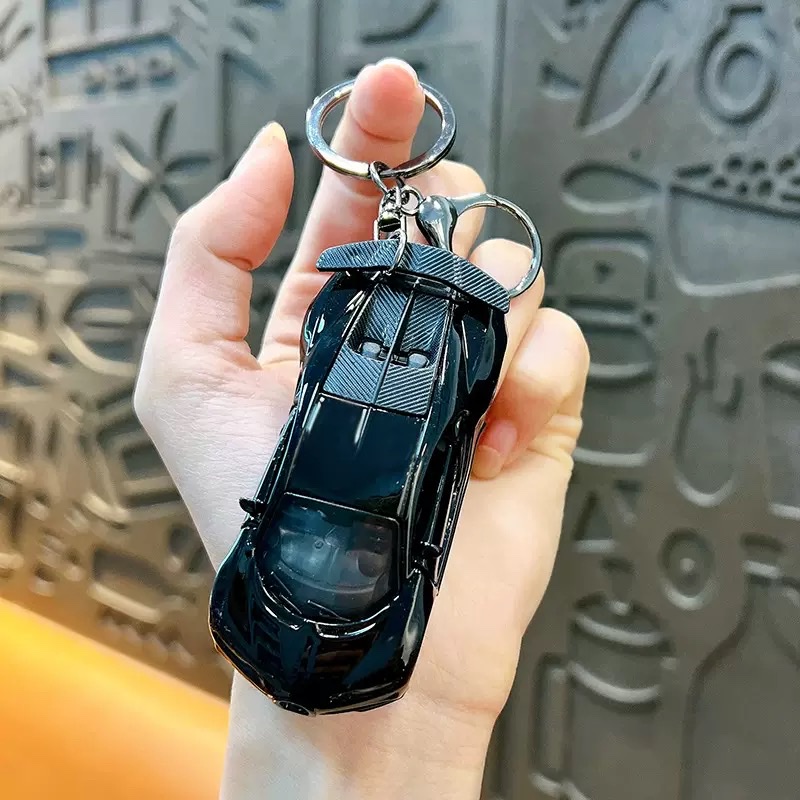 Creative Huili mini sports car keychain pendant, cartoon schoolbag, car hanging decoration, key chain, creative gift wholesale, keychain, keychain accessories detail image 4