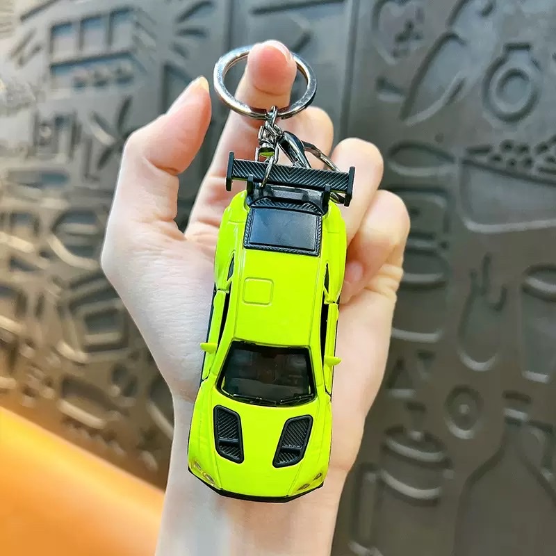 Creative Huili mini sports car keychain pendant, cartoon schoolbag, car hanging decoration, key chain, creative gift wholesale, keychain, keychain accessories detail image 5