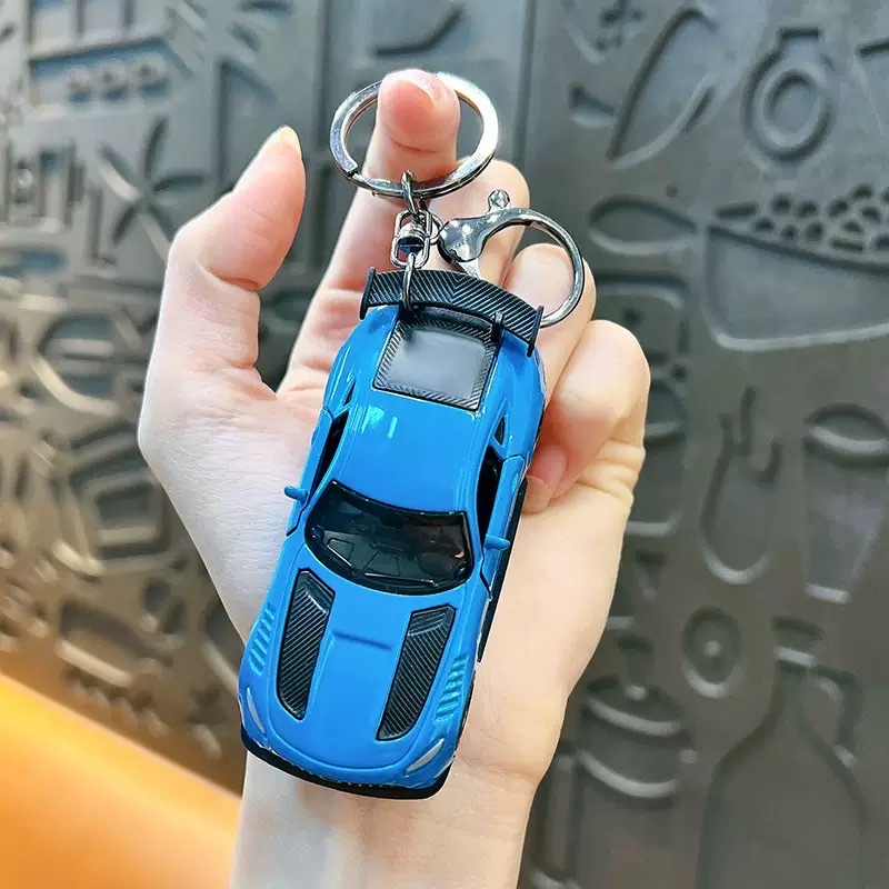 Creative Huili mini sports car keychain pendant, cartoon schoolbag, car hanging decoration, key chain, creative gift wholesale, keychain, keychain accessories detail image 3