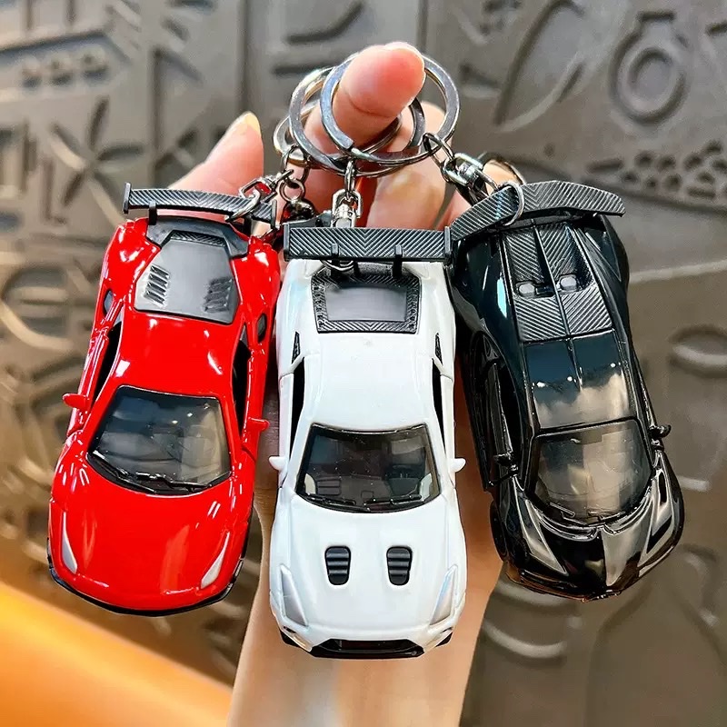 Creative Huili mini sports car keychain pendant, cartoon schoolbag, car hanging decoration, key chain, creative gift wholesale, keychain, keychain accessories details Picture