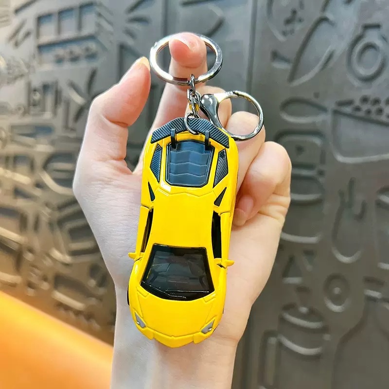 Creative Huili mini sports car keychain pendant, cartoon schoolbag, car hanging decoration, key chain, creative gift wholesale, keychain, keychain accessories detail image 7