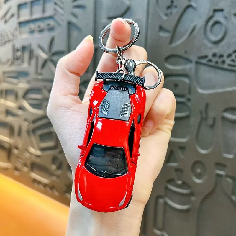 Creative Huili mini sports car keychain pendant, cartoon schoolbag, car hanging decoration, key chain, creative gift wholesale, keychain, keychain accessories detail image 9