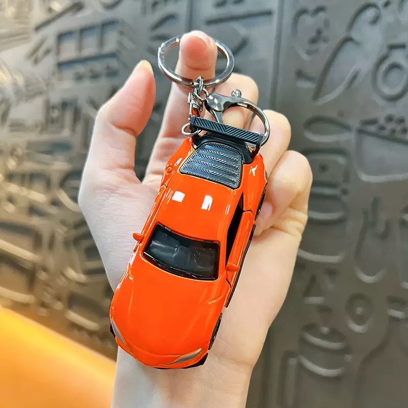 Creative Huili mini sports car keychain pendant, cartoon schoolbag, car hanging decoration, key chain, creative gift wholesale, keychain, keychain accessories detail image 6
