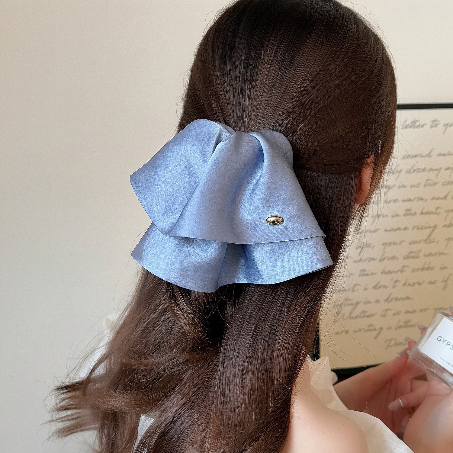 The solid-color satin bow hair clip at the back of the head is super ethereal, light luxury, fashionable and stylish. The ponytail clip is sweet and cute. It's for girls detail image 2
