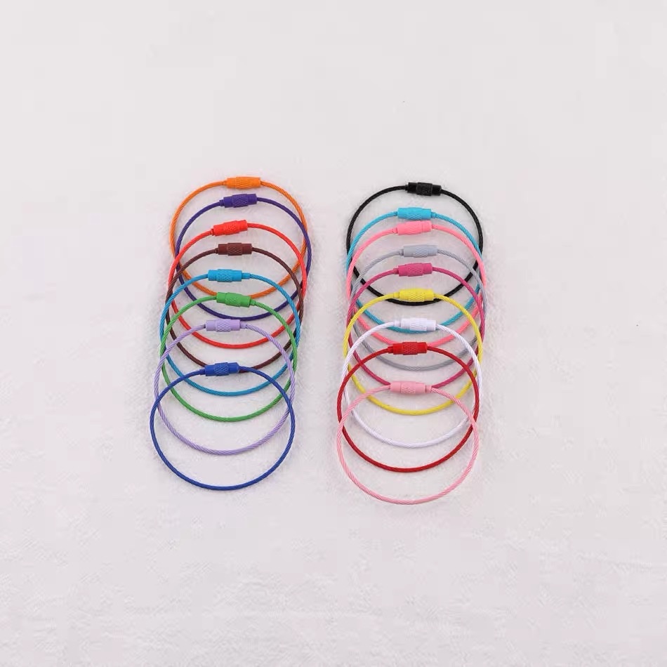 diy jewelry accessories materials: colored spray paint, steel wire rings, steel wire ropes, rotating screws, key rings, key chains