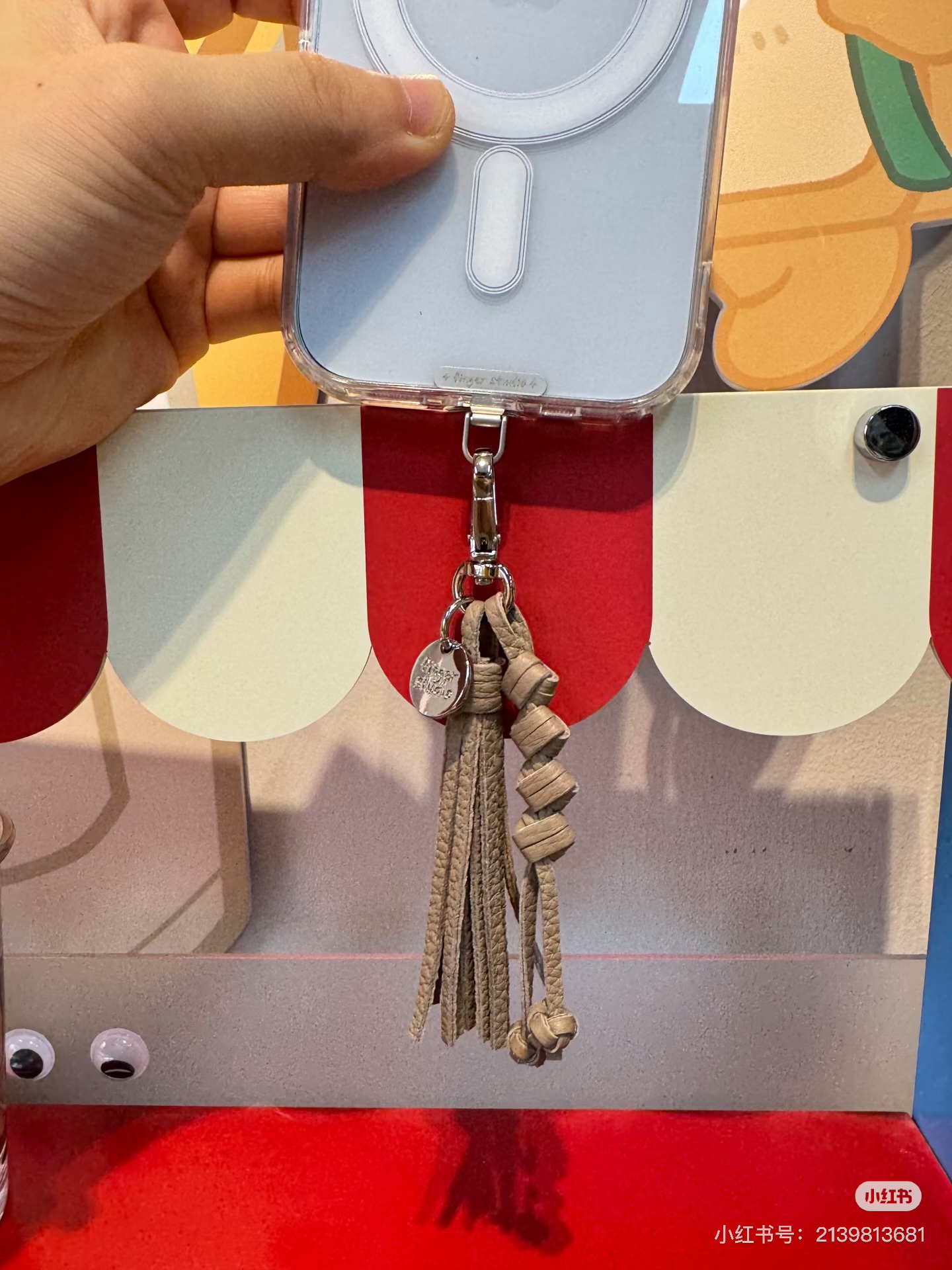 海星滴油合金手机链流苏挂件时尚个性潮流配饰创意礼品白底实物图