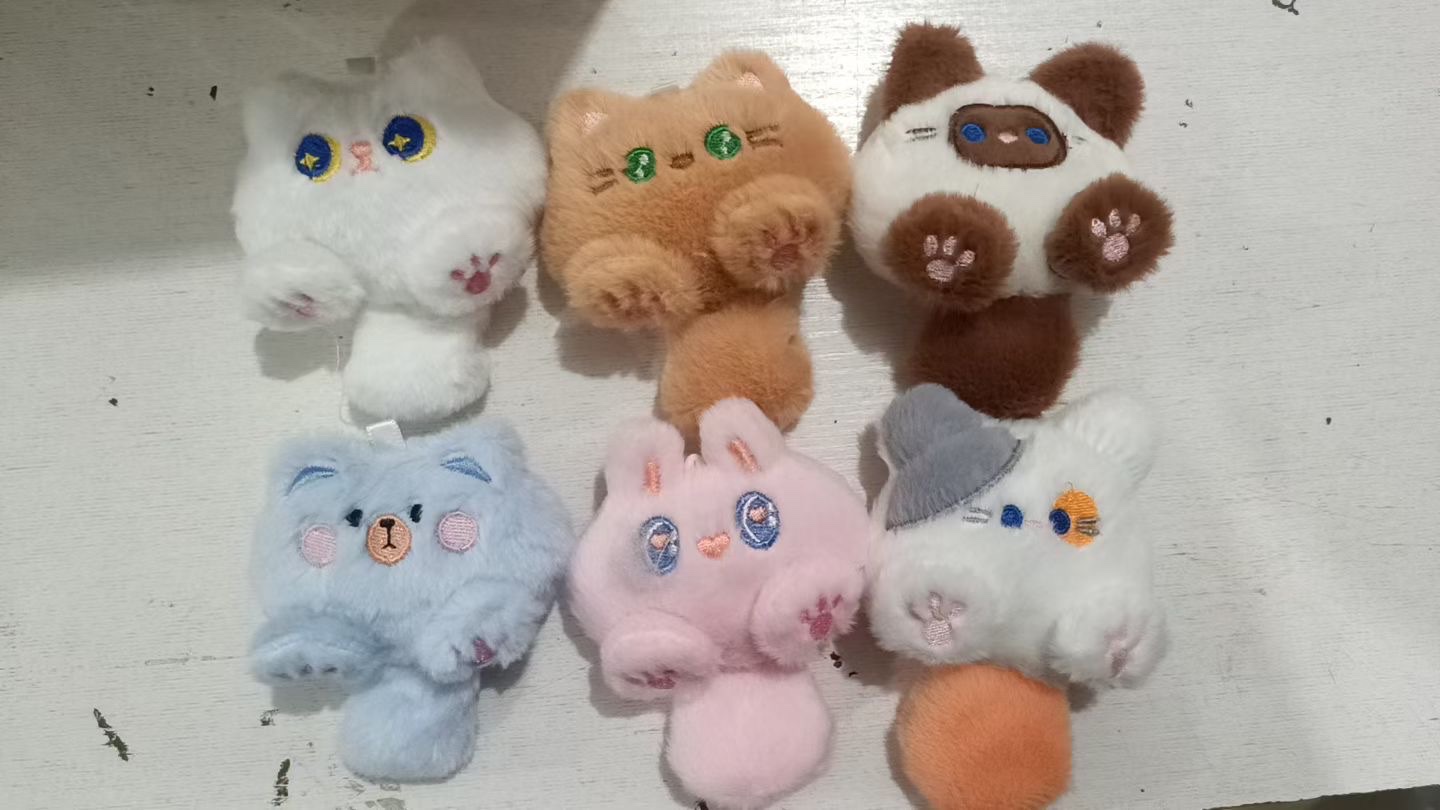 小猫bb叫甩尾挂件颜色多样功能居多款式新颖吱吱叫毛绒玩具