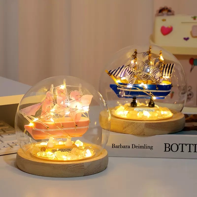 Small sailboat and night light ornaments