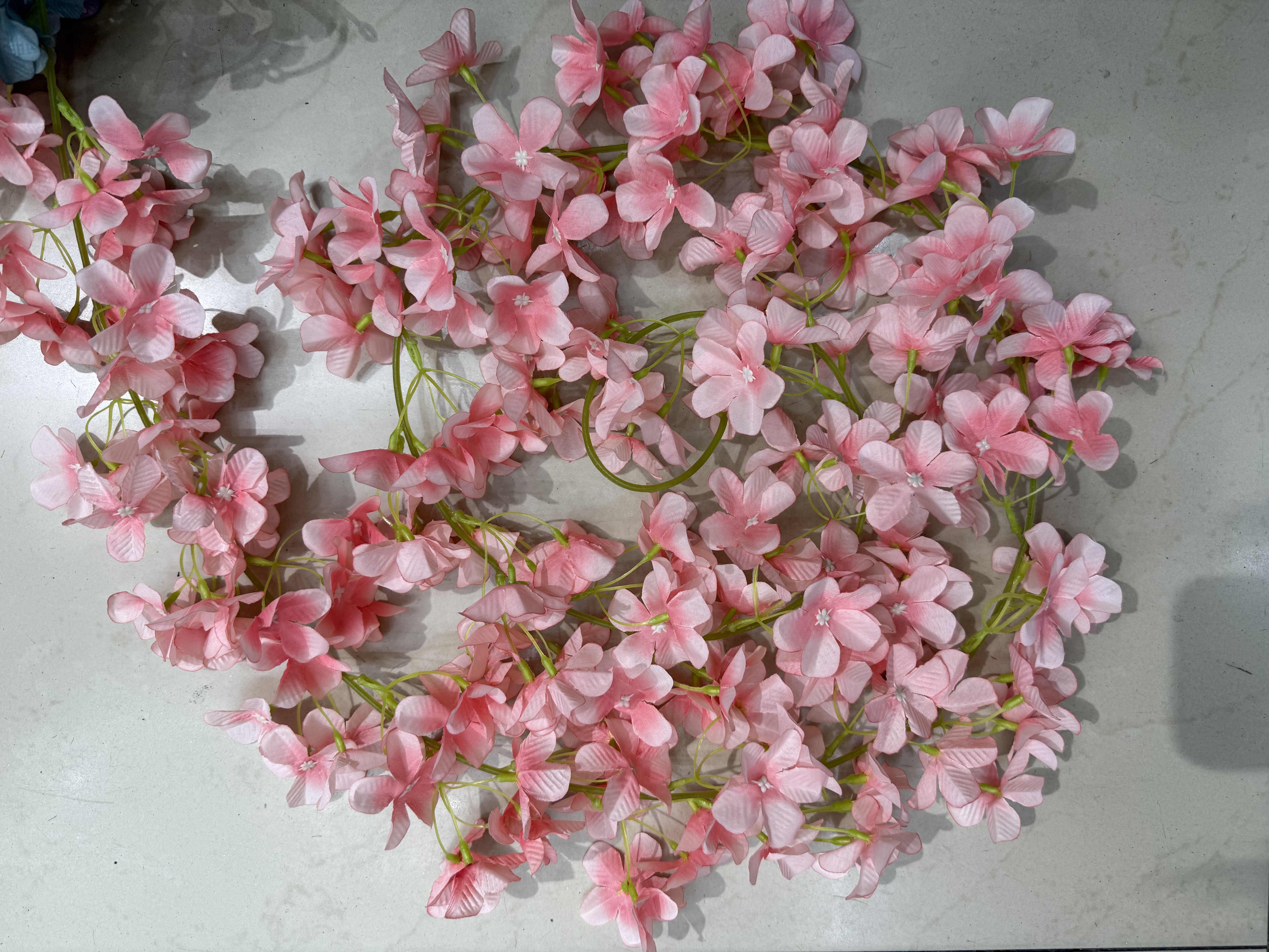 Artificial flower vine rose, artificial flower vine air conditioning pipes cover the living room ceiling decoration, plastic vines entwine the plant rose vine Item Picture