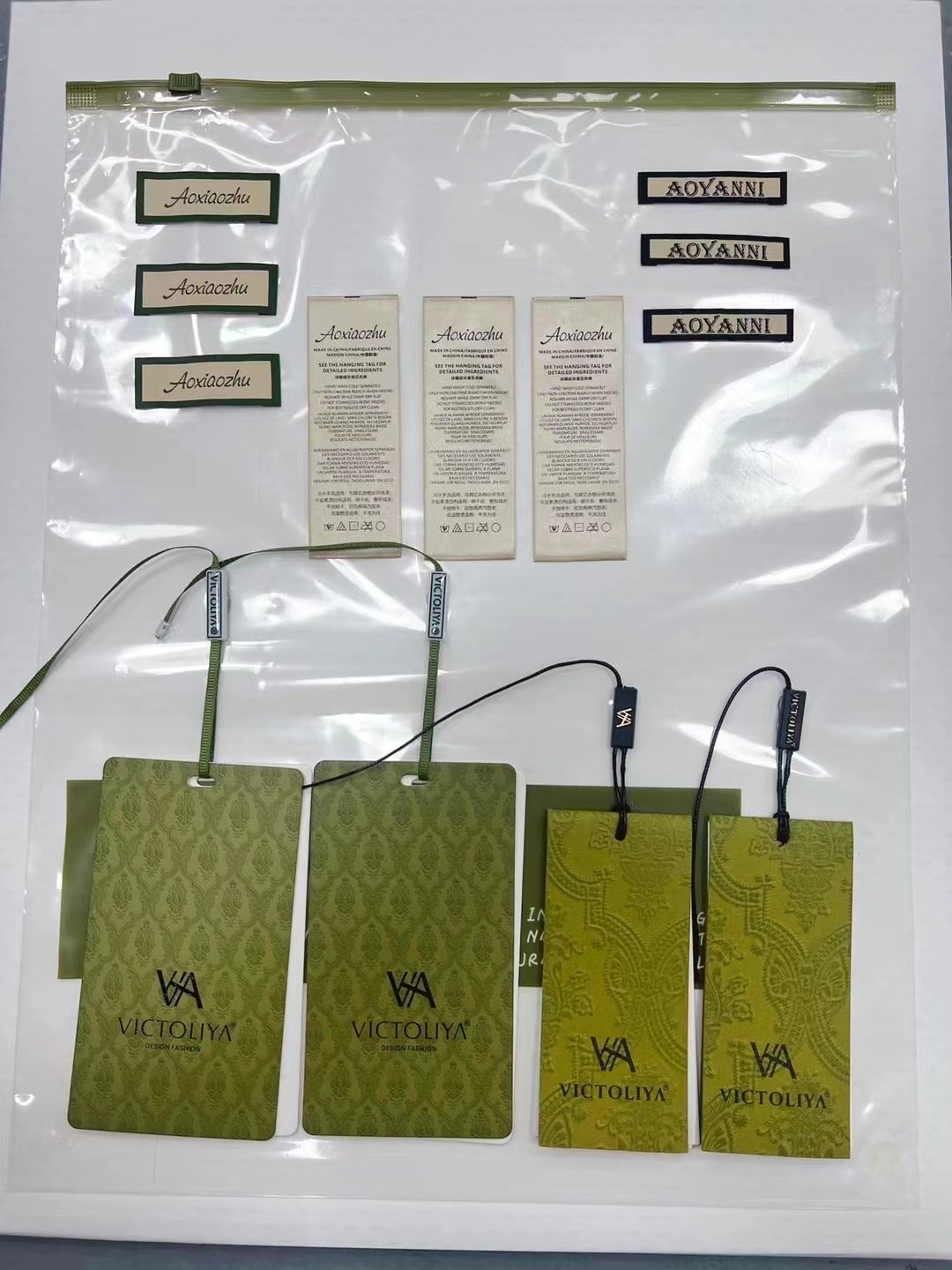 商标吊牌辅料，包装设计生产白底实物图