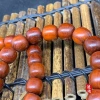Chinese-style blood sandalwood multi-treasure bead bracelet, new Chinese-style sandalwood old-style bead plain ring cultural play Buddhist bead bracelet woven Application Scenario