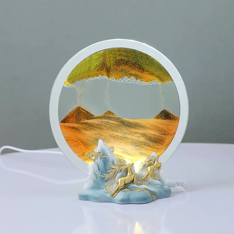 A small night light ornament with a deer by the side of flowing sand Item Picture