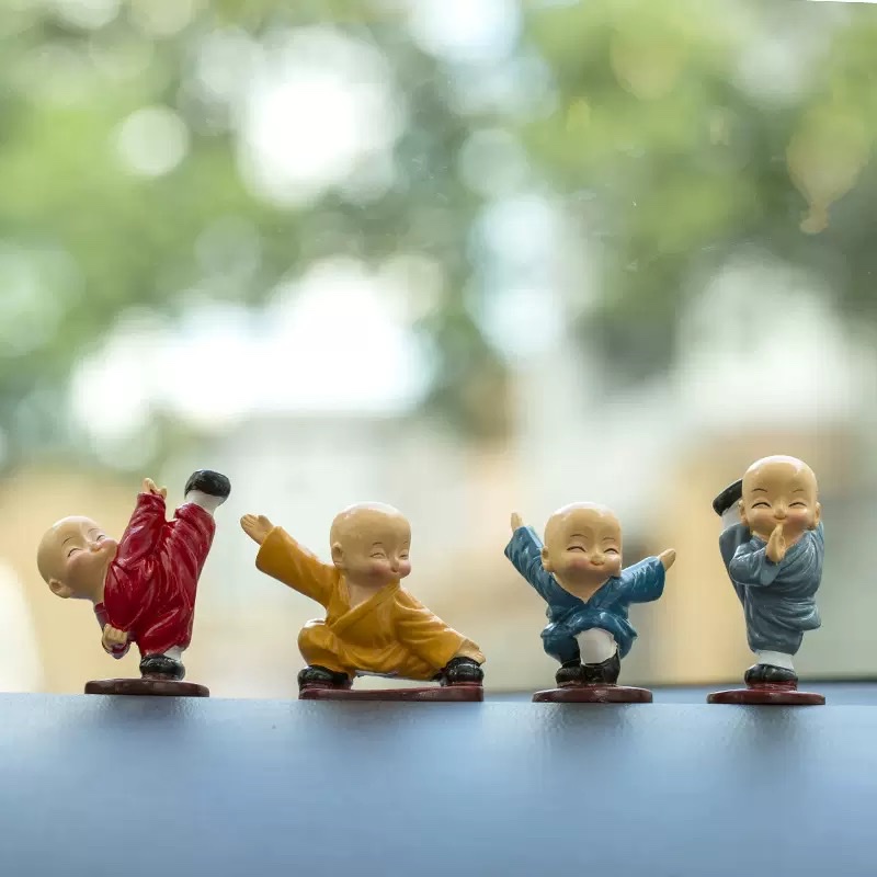 Four cute car accessories and interior decorations featuring Kung Fu monks, men's car center consoles, and Shaolin Kung Fu boys details Picture
